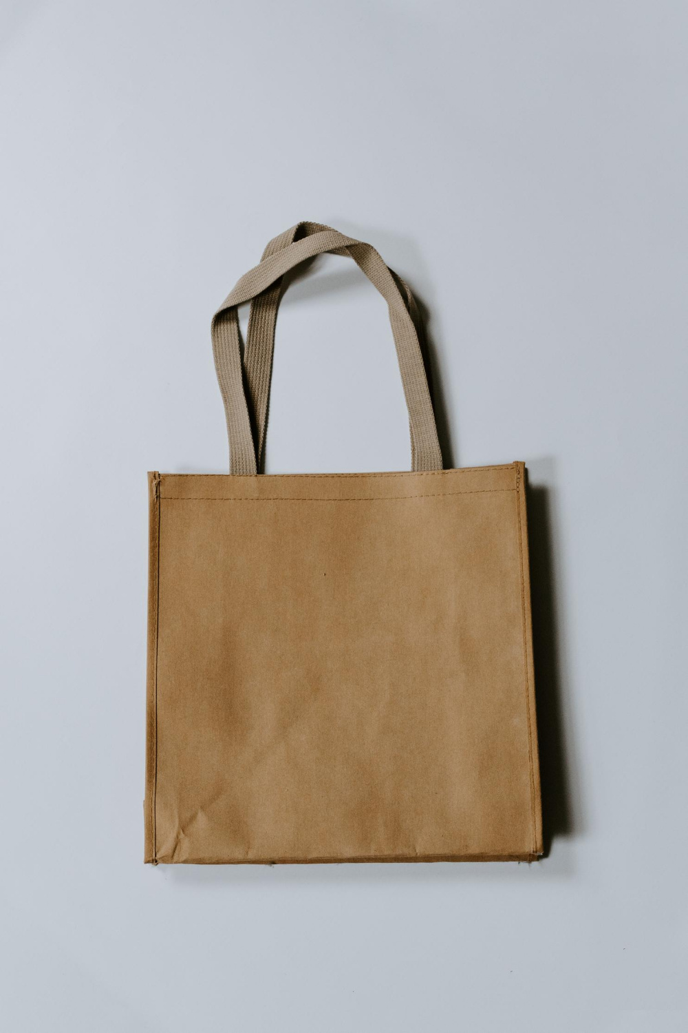Brown shopping bag on white background