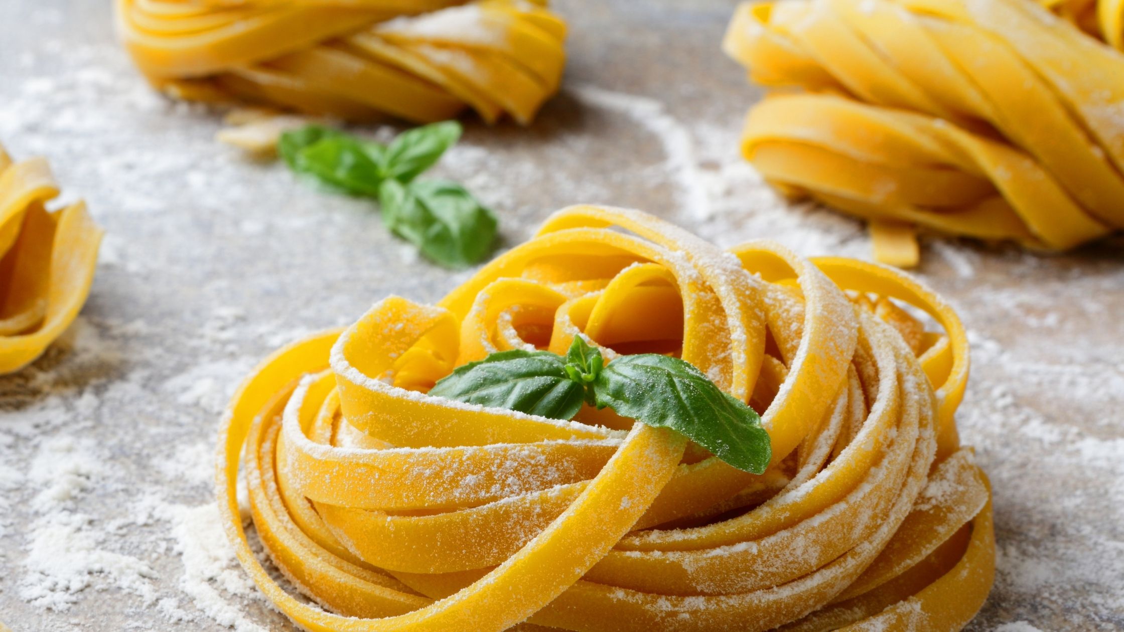 Fresh pasta noodles with basil